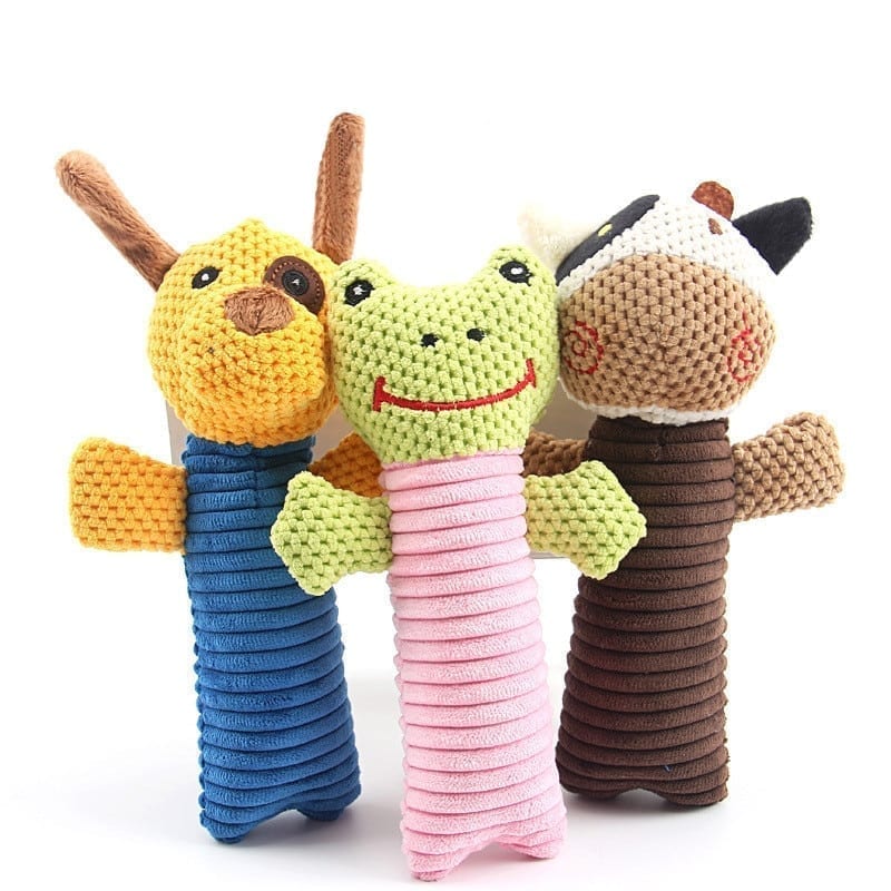 A pig toy shouts at a click to play for a dog