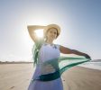 happy-woman-dancing-on-beach---------------------utc-----x